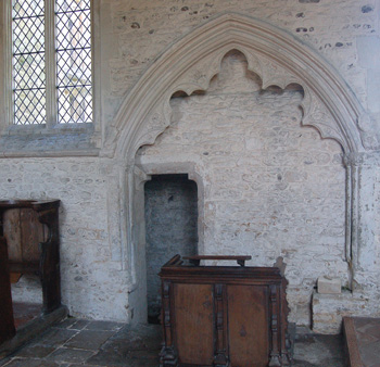 Passage cut into the north wall of the chancel May 2008
